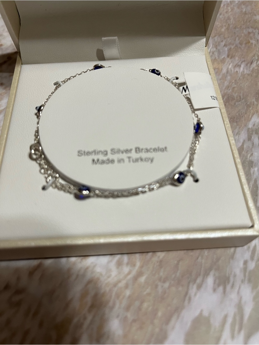 Cynthia Rowley Silver Bracelet with Blue Eye Charms